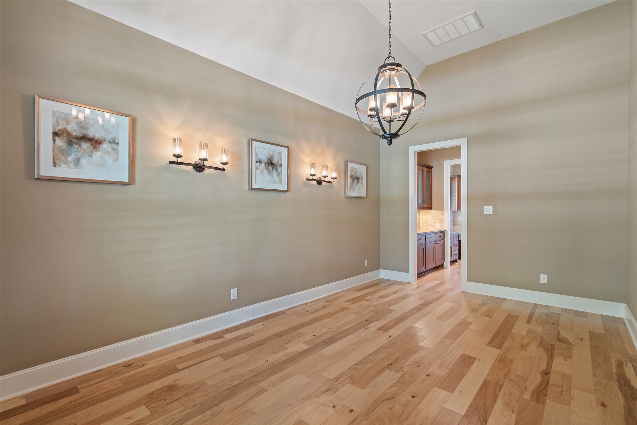 732 SANTALUZ Path Austin, TX 78732 - Photo 18 of 40 a view of a room with wooden floor