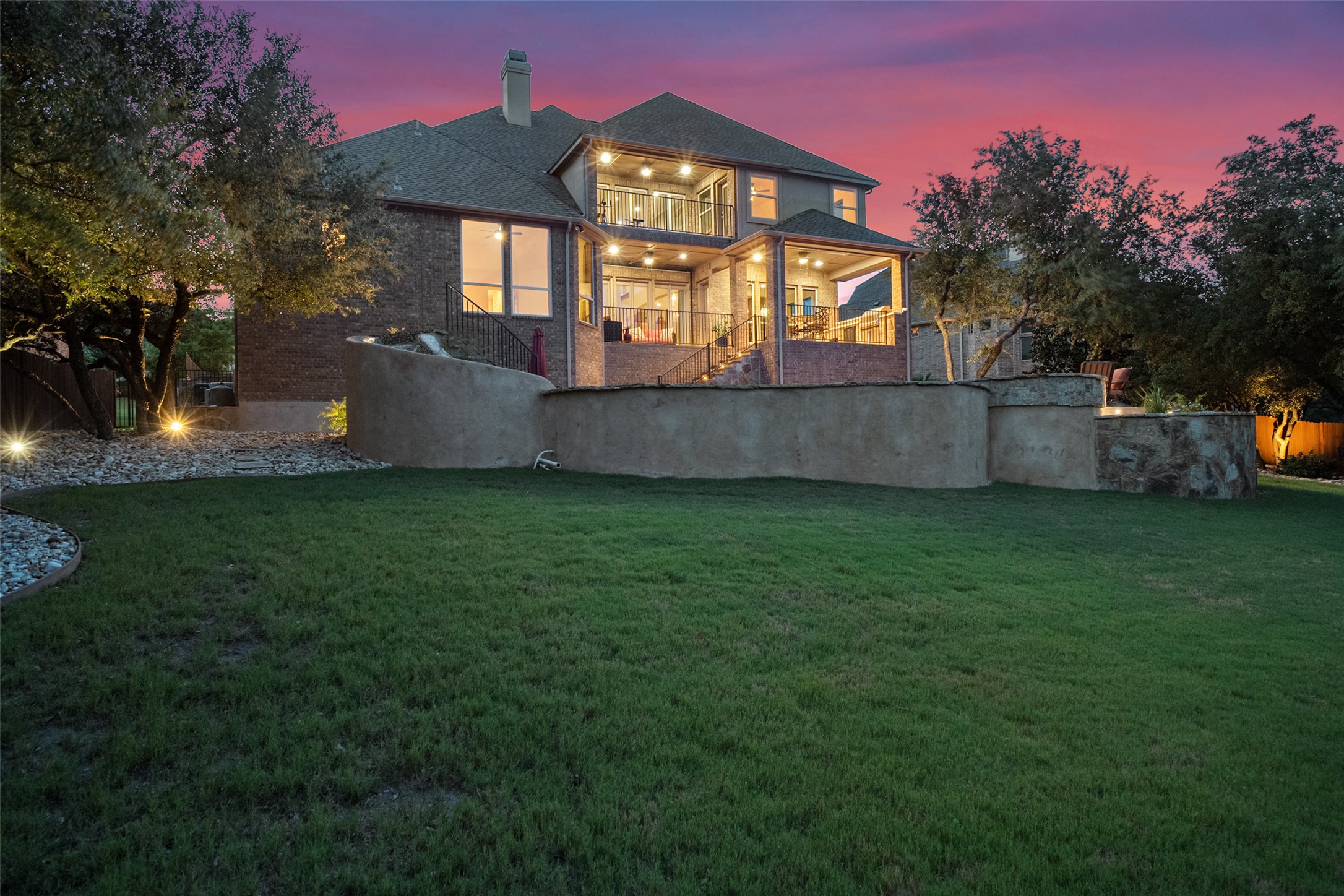 732 SANTALUZ Path Austin, TX 78732 - Photo 34 of 40 a front view of a house with garden