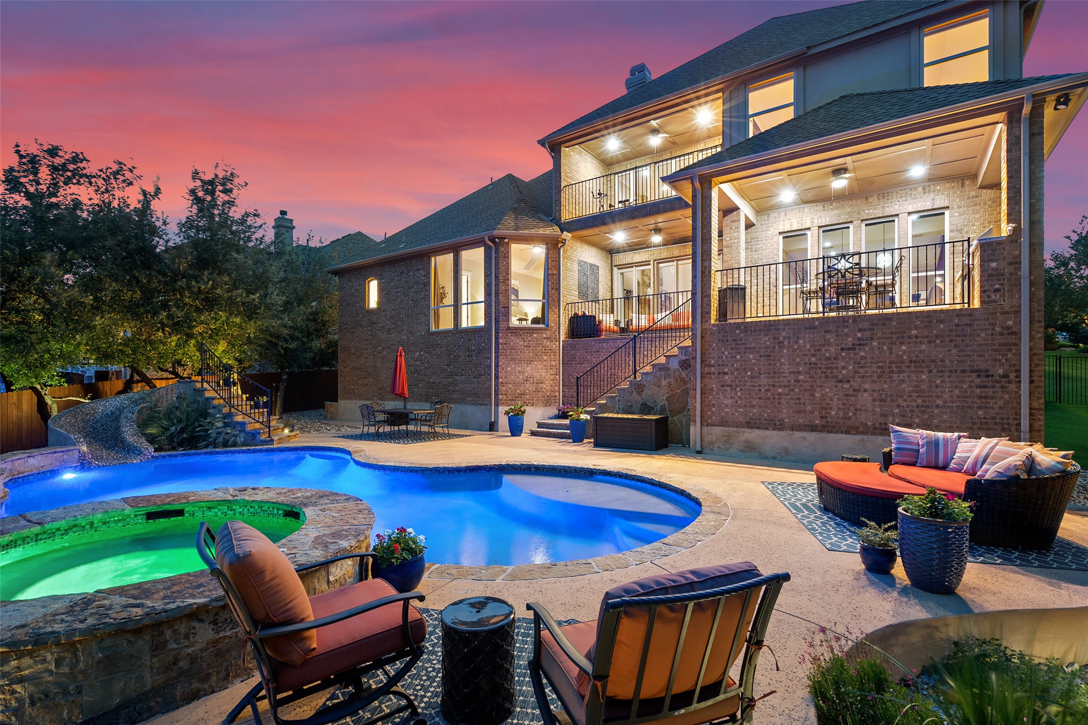 732 SANTALUZ Path Austin, TX 78732 - Photo 36 of 40 a swimming pool with outdoor seating and yard