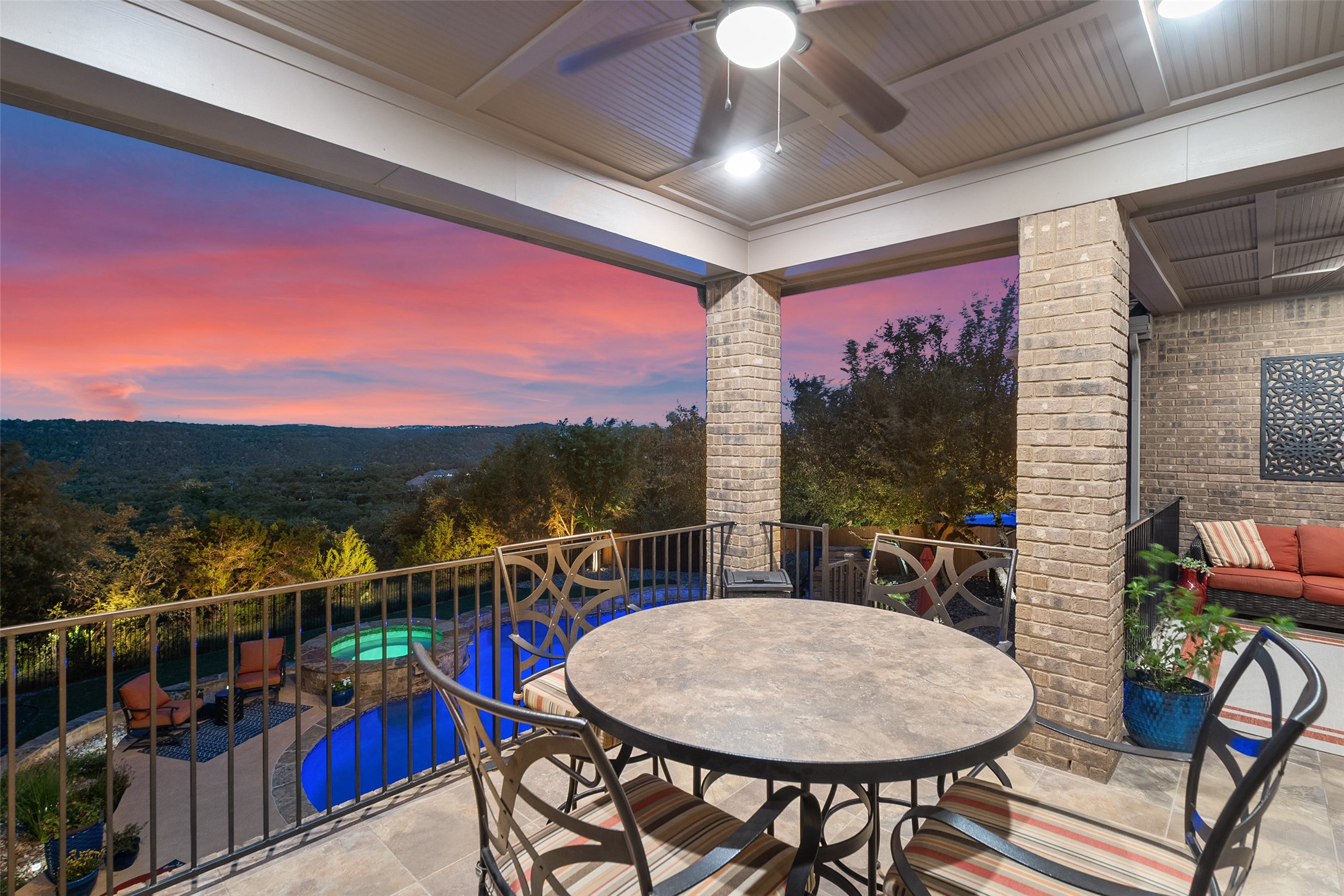 732 SANTALUZ Path Austin, TX 78732 - Photo 37 of 40 a view of a chairs and table in patio