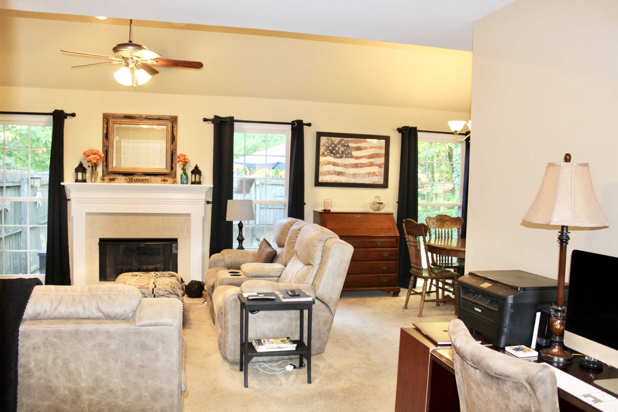 800 Oak Ridge Drive Springfield, TN 37172 - Photo 15 of 48 a living room with furniture a fireplace and a flat screen tv