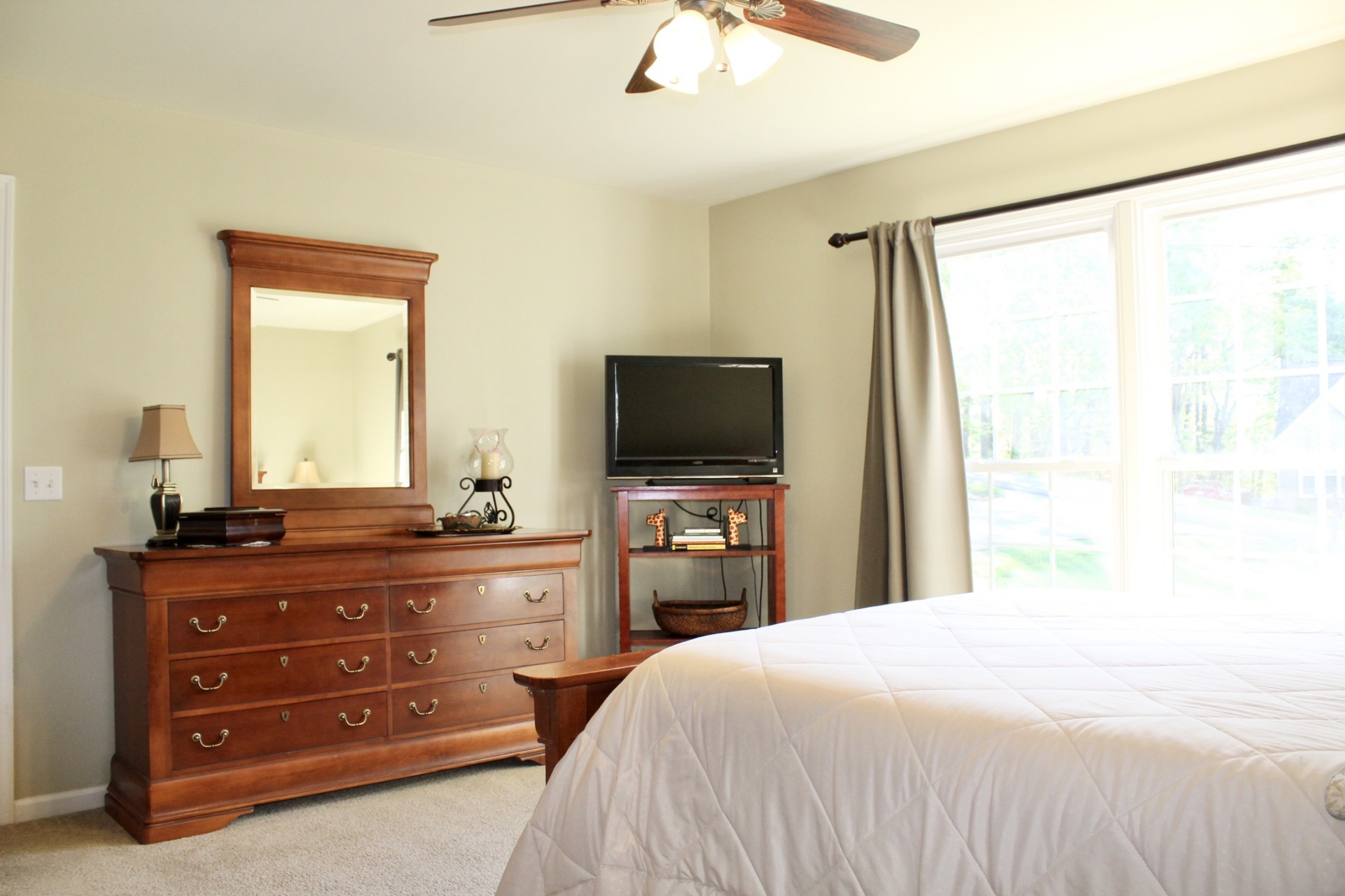 800 Oak Ridge Drive Springfield, TN 37172 - Photo 23 of 48 a bedroom with a bed and a flat tv screen on dresser