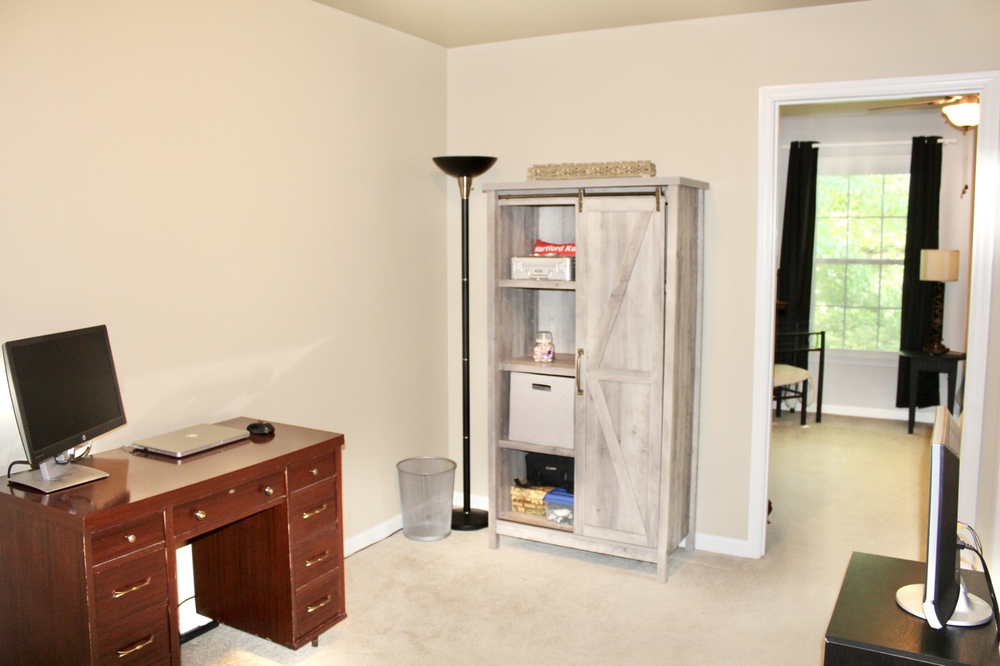 800 Oak Ridge Drive Springfield, TN 37172 - Photo 34 of 48 a view of a workspace with furniture and a flat screen tv