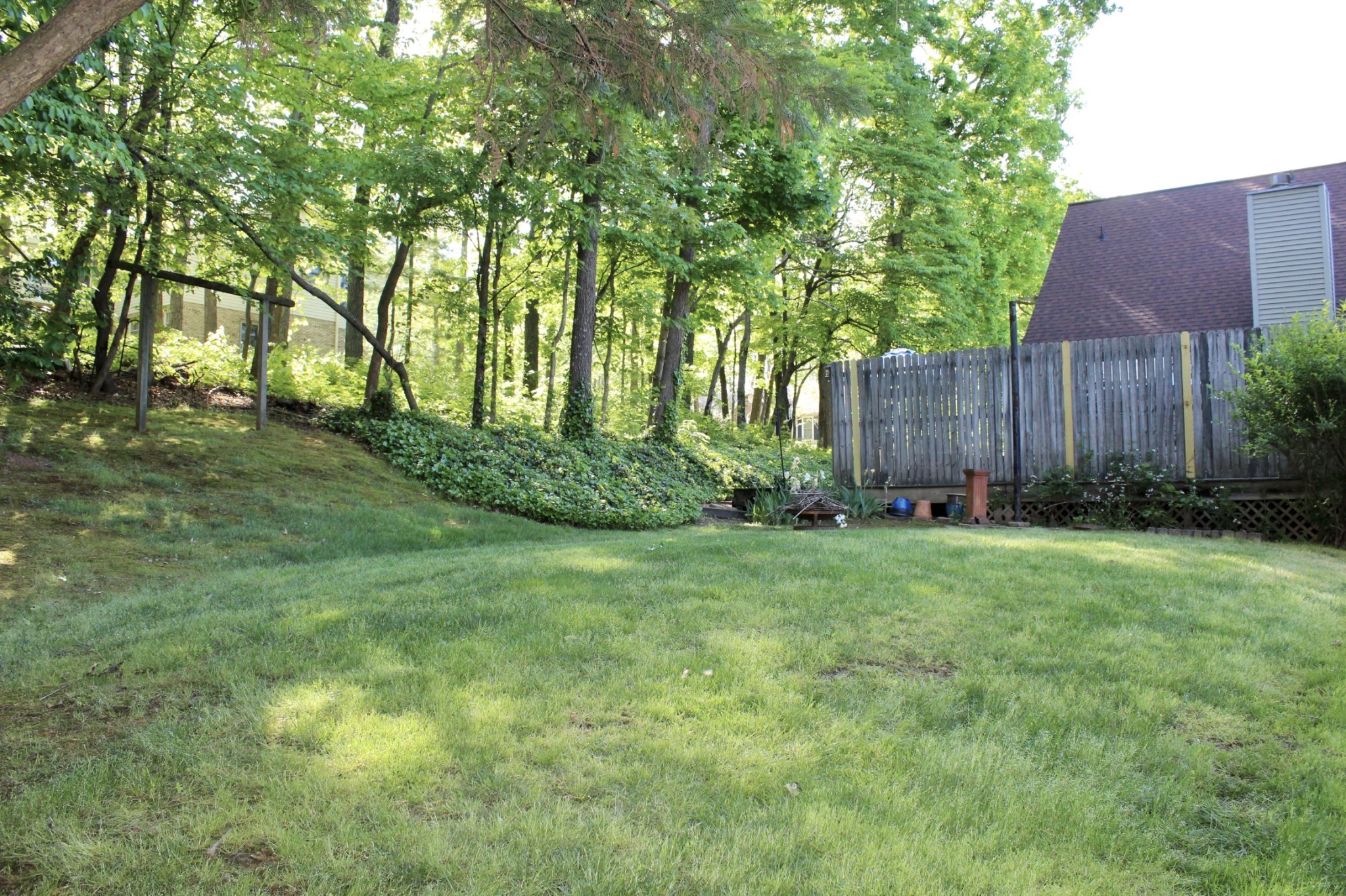 800 Oak Ridge Drive Springfield, TN 37172 - Photo 6 of 48 a view of a backyard with potted plants and large trees