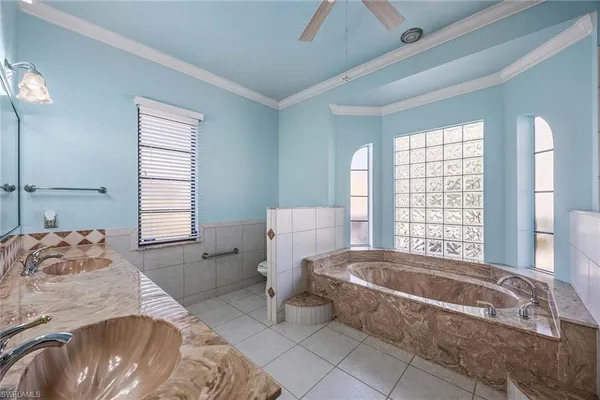a bathroom with a bathtub and shower