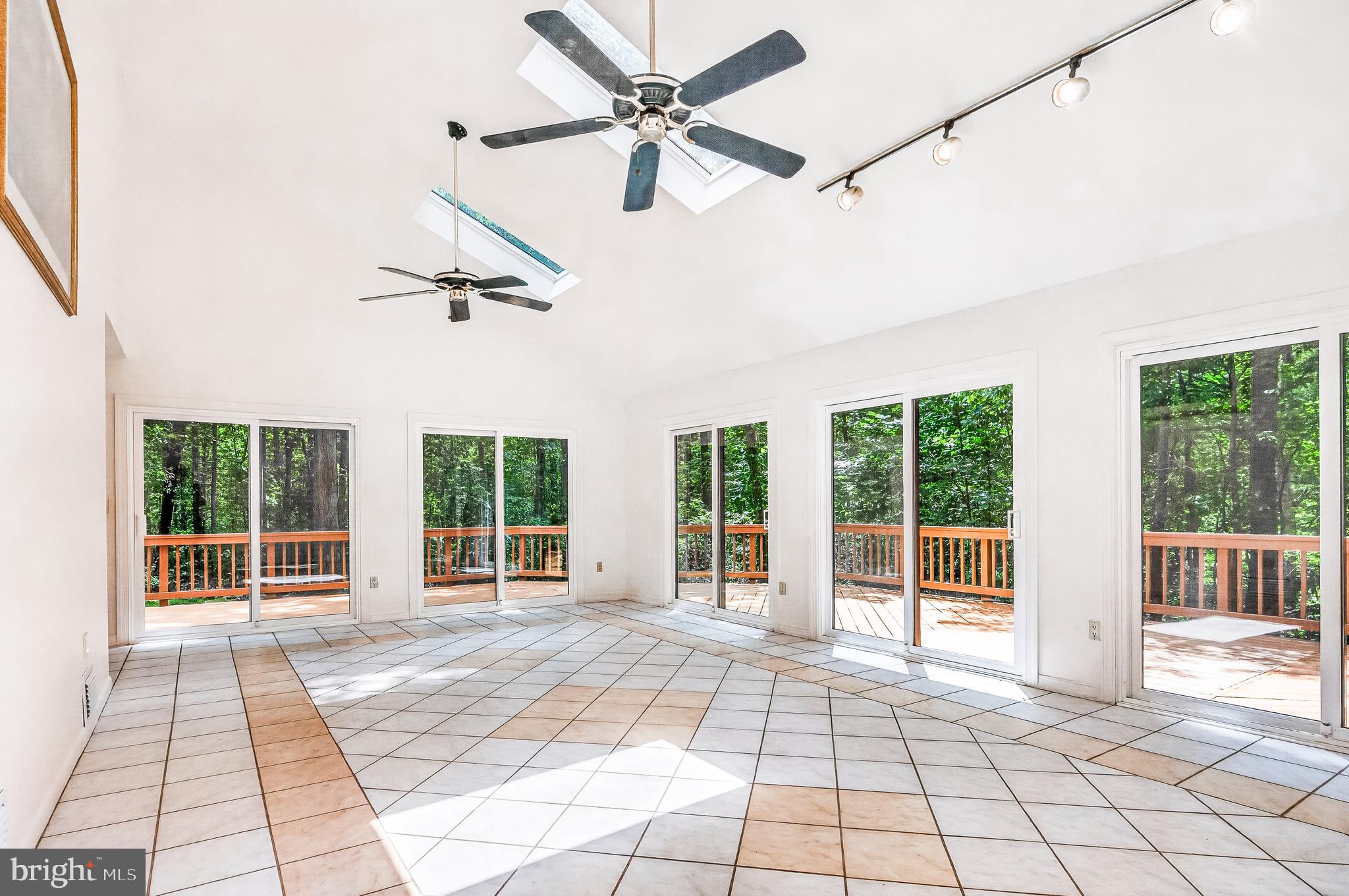 10817 Cross School Road Reston, VA 20191 - Photo 74 of 89 Greet Room with 5 Sliding Doors to Deck