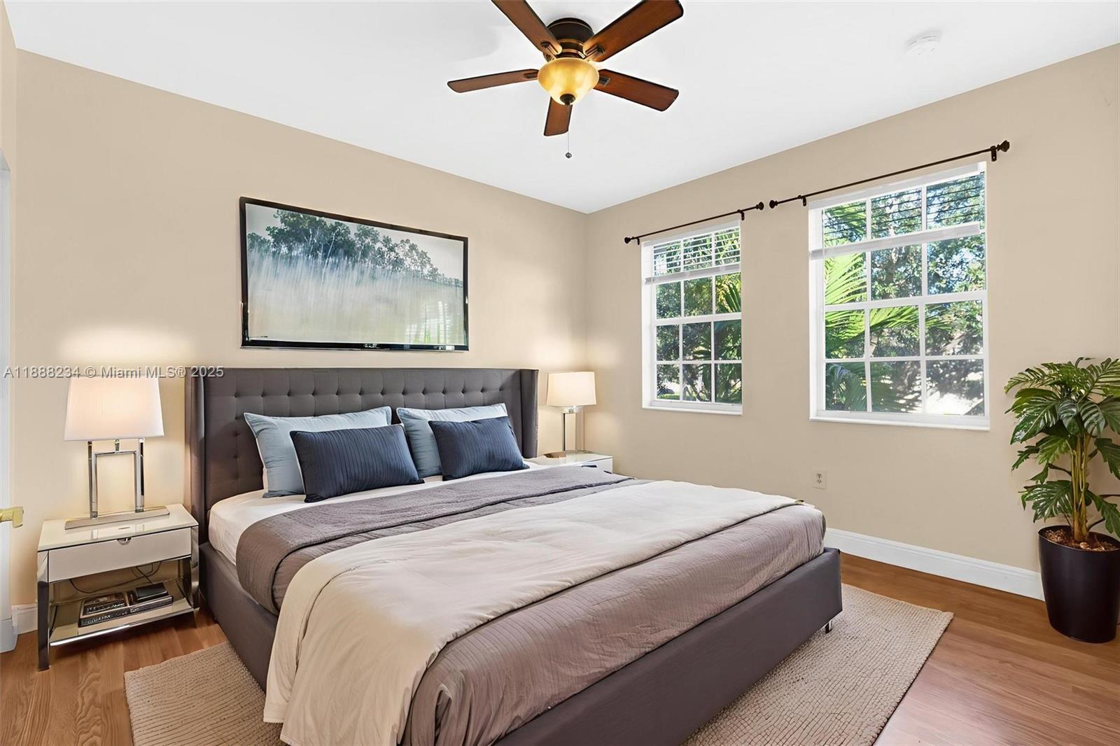 2508 Southwest 85th Terrace, Unit 105 Miramar, FL 33025 - Photo 18 of 27 a bedroom with bed and window