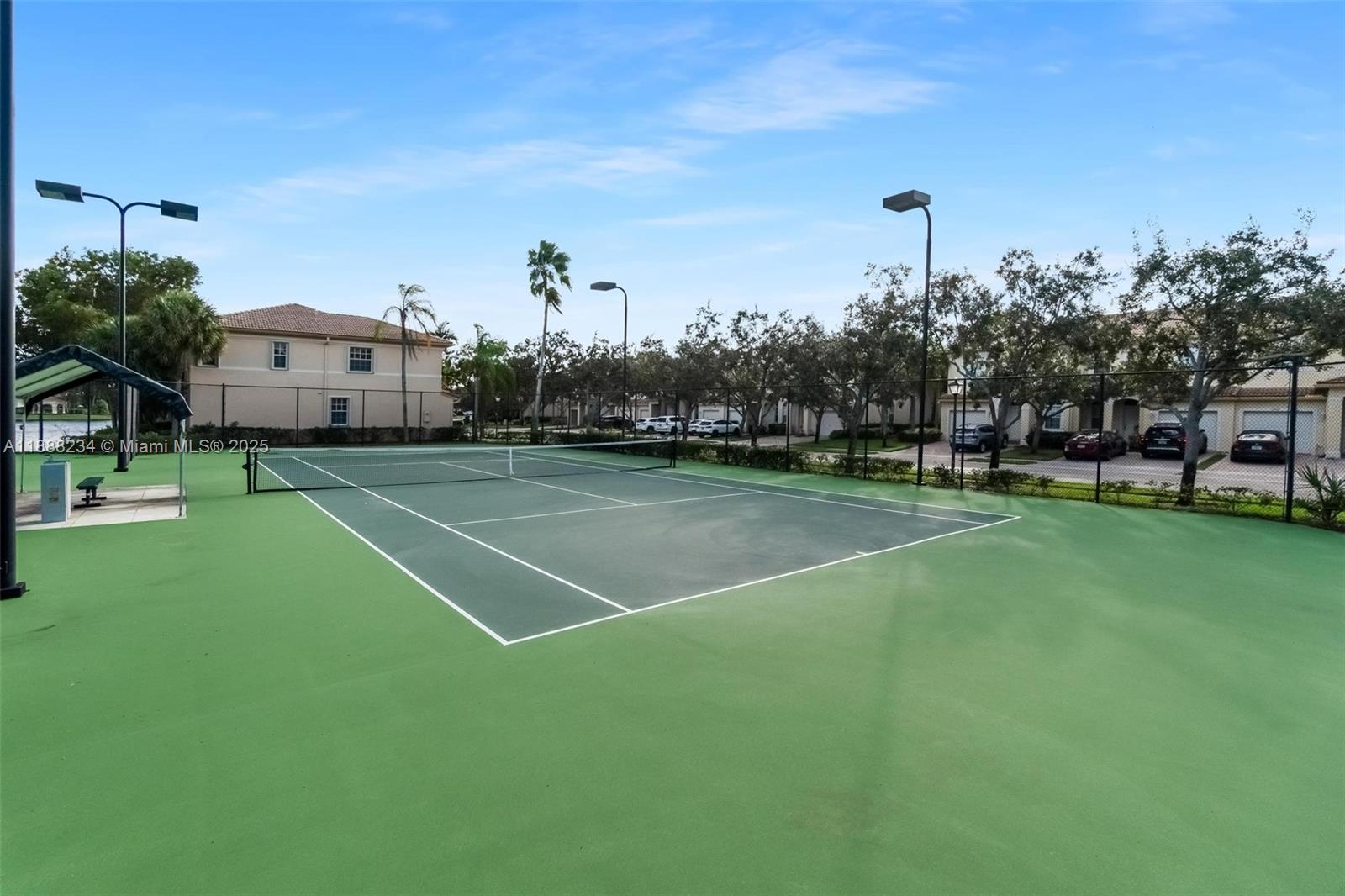 2508 Southwest 85th Terrace, Unit 105 Miramar, FL 33025 - Photo 4 of 27 a view of a tennis court