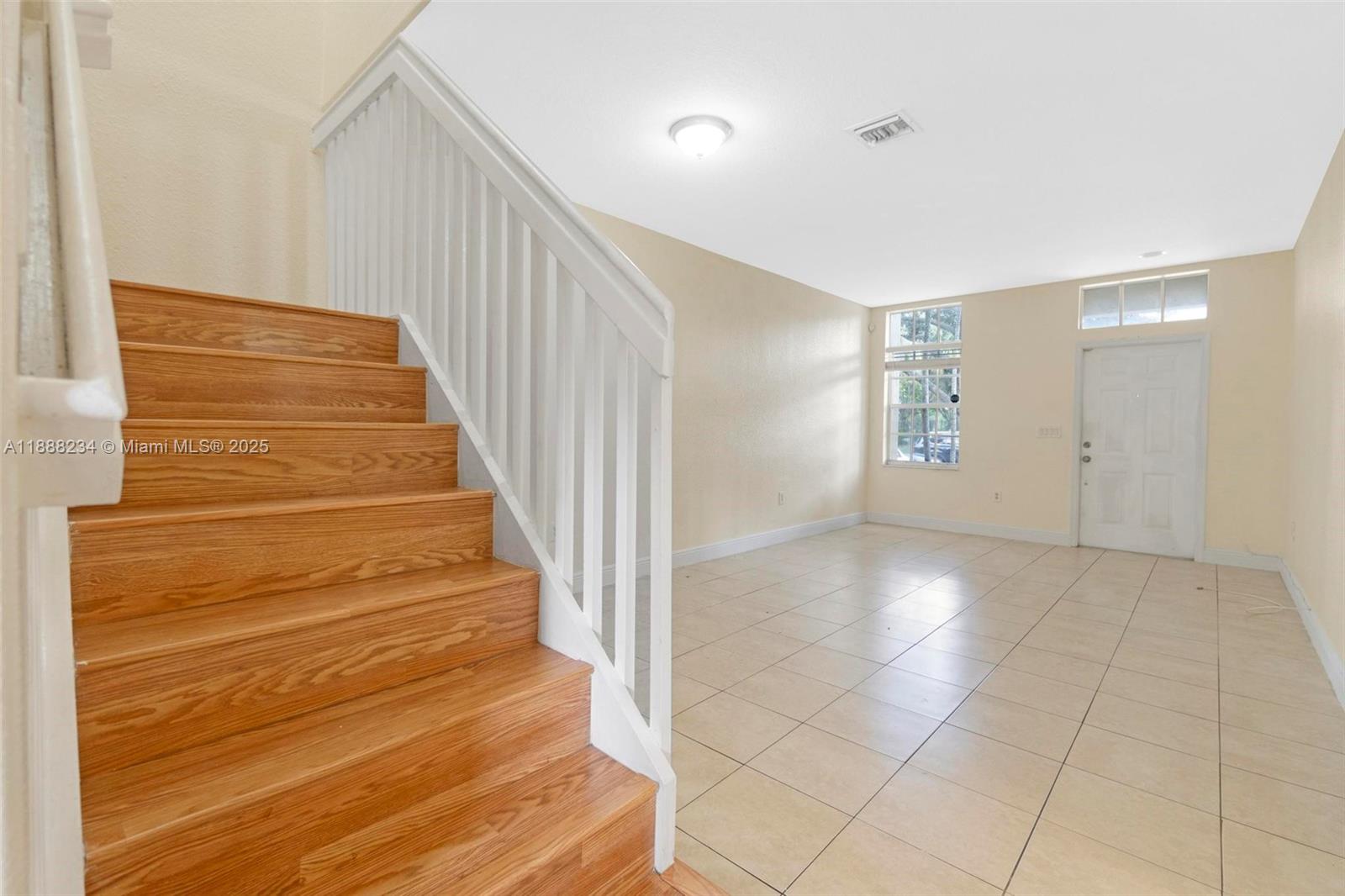 2508 Southwest 85th Terrace, Unit 105 Miramar, FL 33025 - Photo 7 of 27 a view of entryway and hall with wooden floor