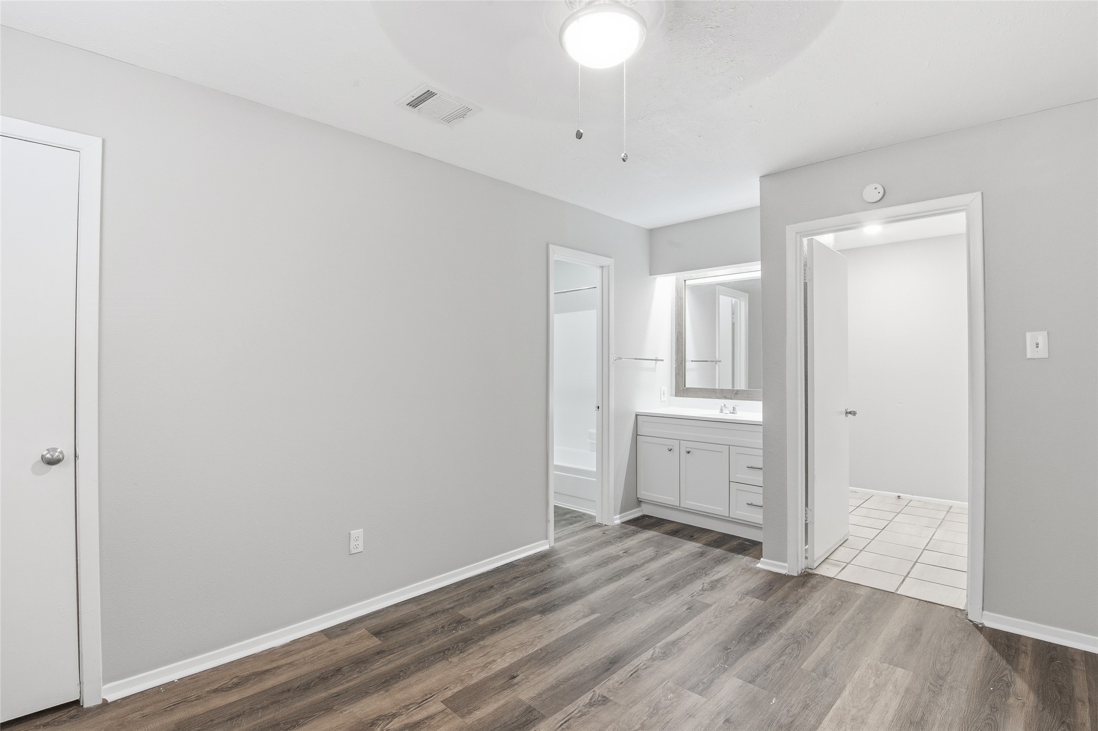 6519 Bridgegate Drive Spring, TX 77373 - Photo 19 of 23 a view of an empty room with wooden floor and closet
