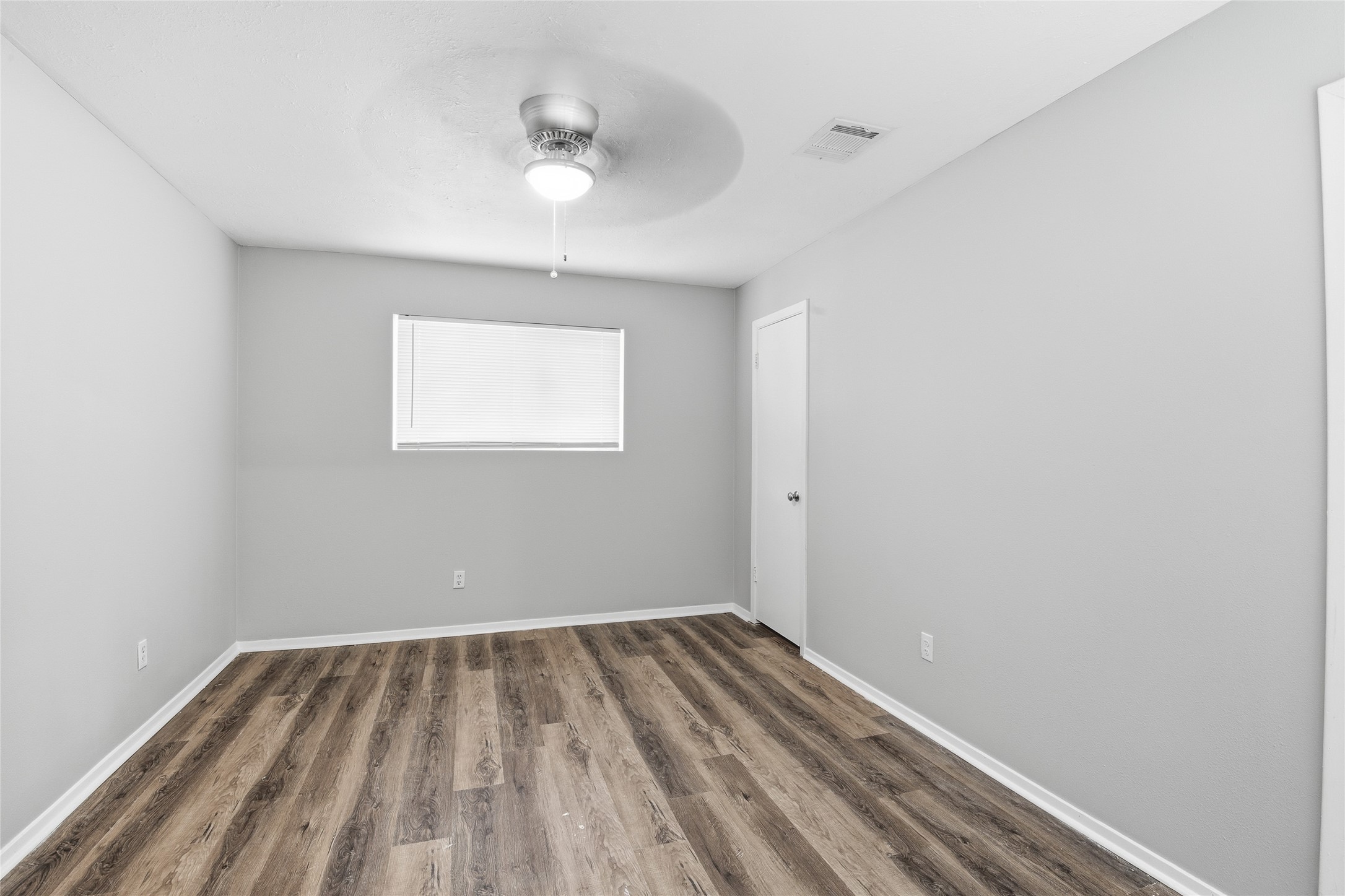 6519 Bridgegate Drive Spring, TX 77373 - Photo 20 of 23 wooden floor in an empty room with a window