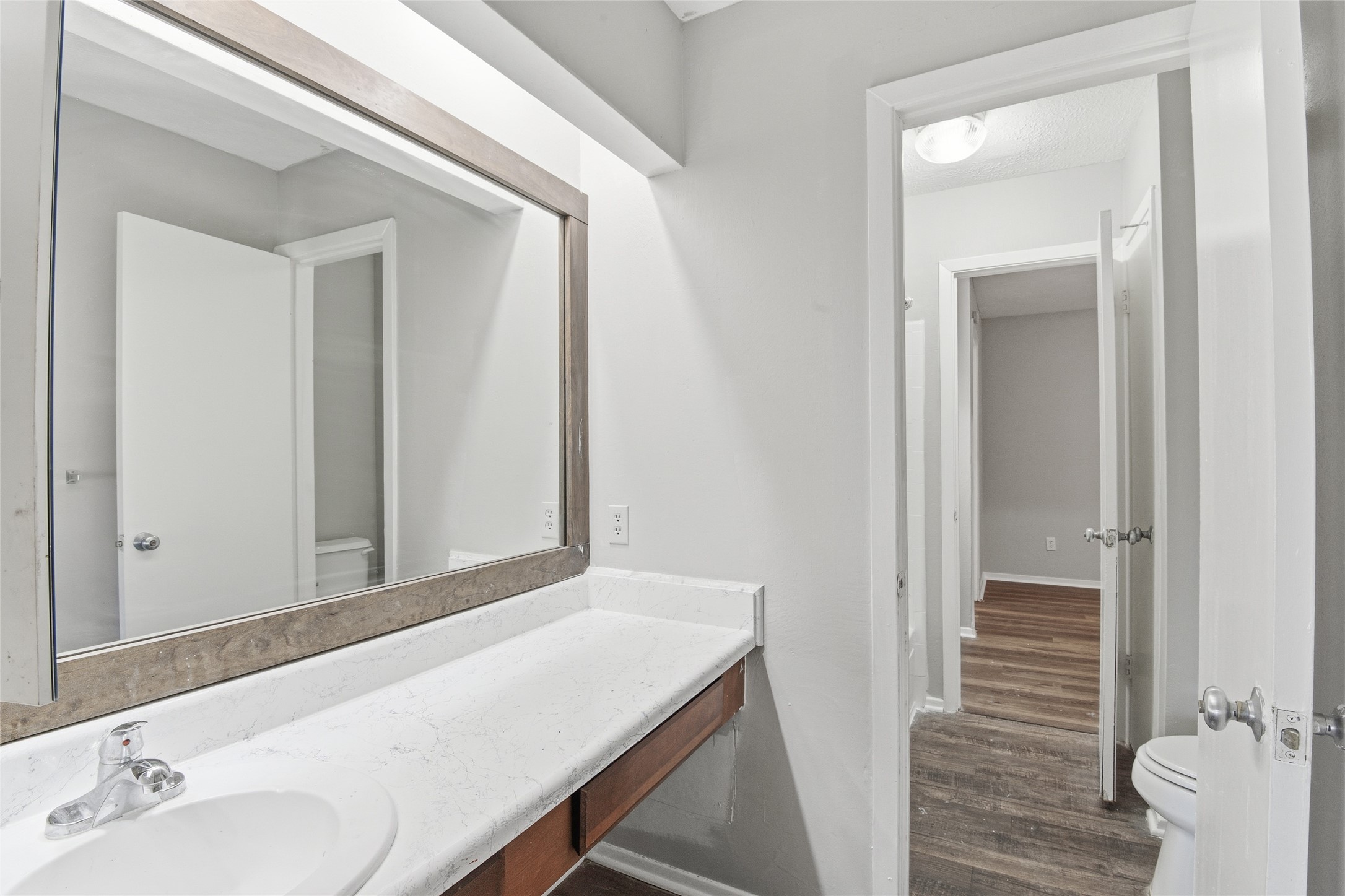 6519 Bridgegate Drive Spring, TX 77373 - Photo 21 of 23 a bathroom with a sink and a mirror