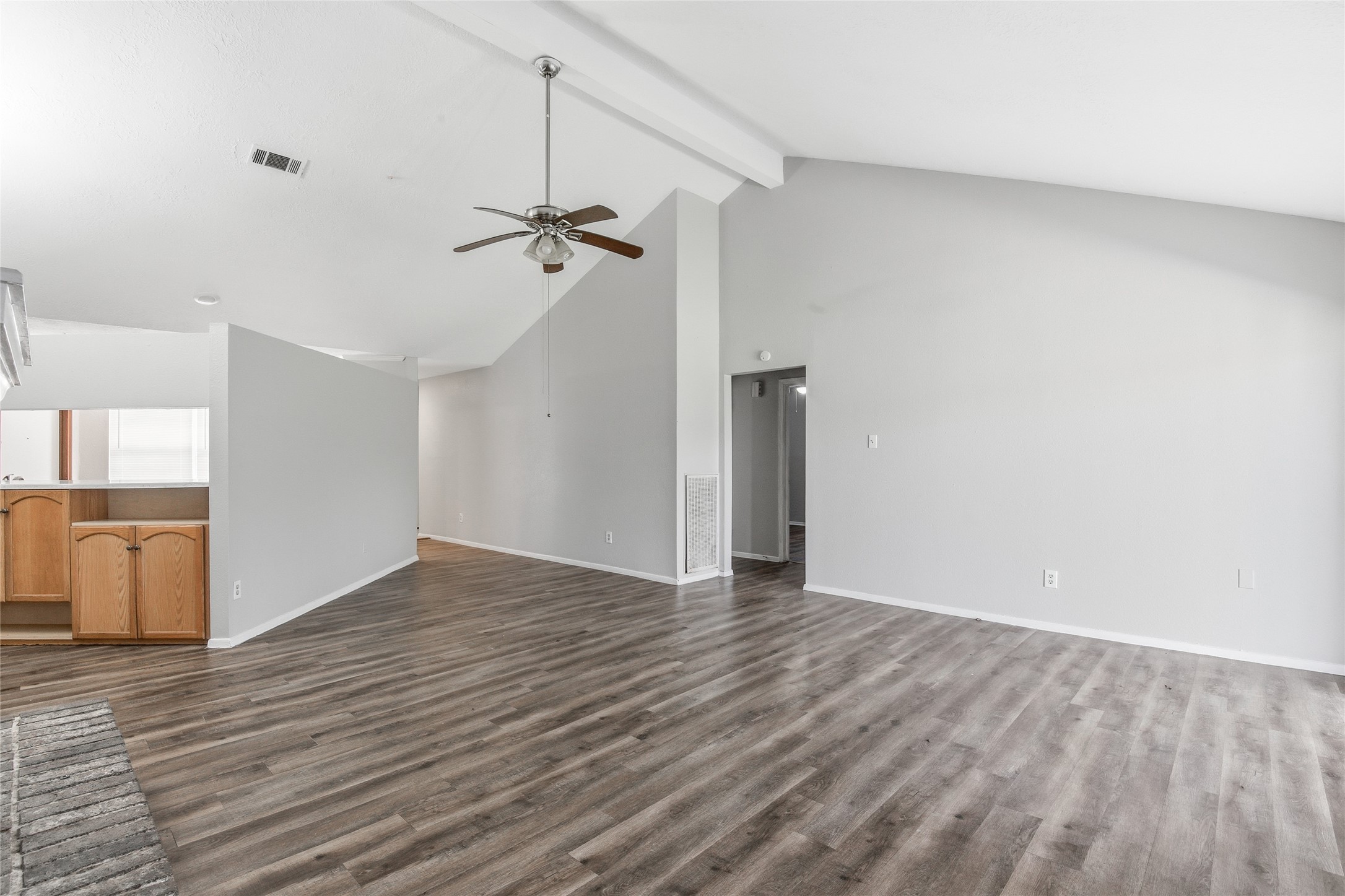 6519 Bridgegate Drive Spring, TX 77373 - Photo 7 of 23 wooden floor in an empty room with a window