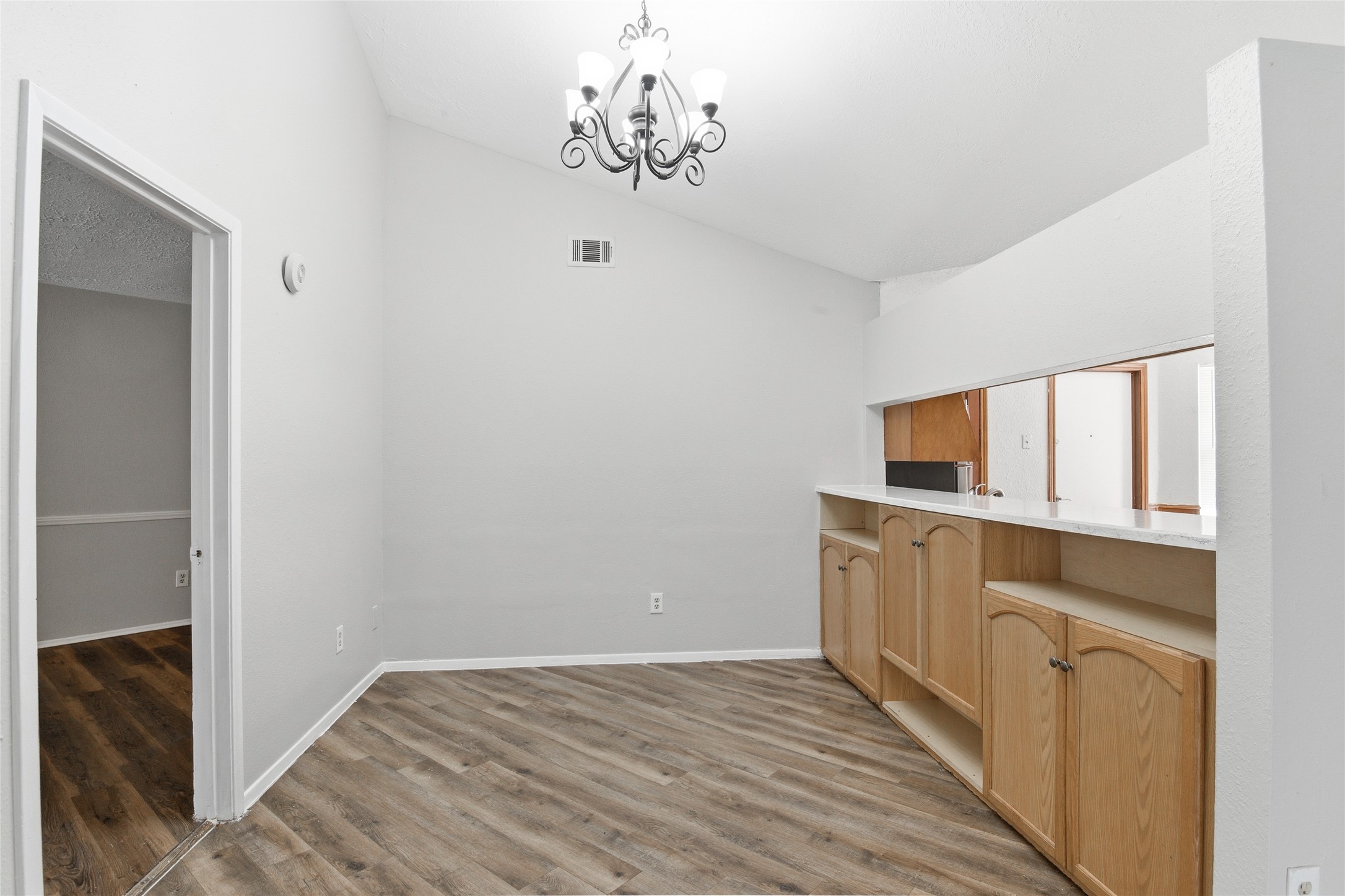 6519 Bridgegate Drive Spring, TX 77373 - Photo 8 of 23 a view of a kitchen from the hallway