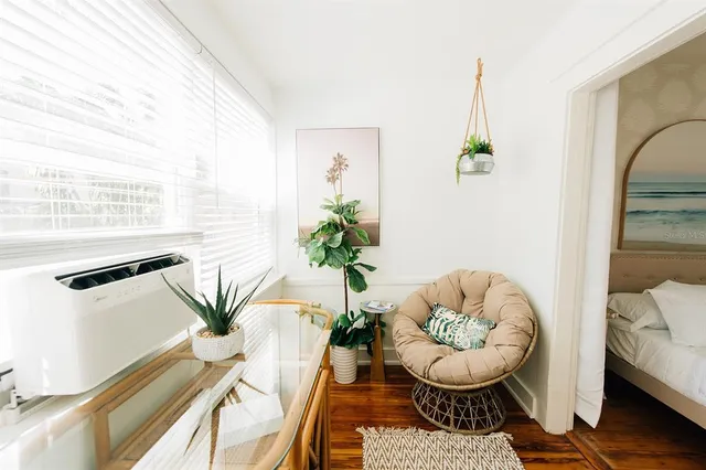 a bathroom with a sink and a window