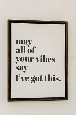 a bathroom with a sink a toilet and a window