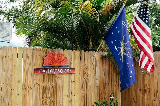 a street sign that is on a small yard