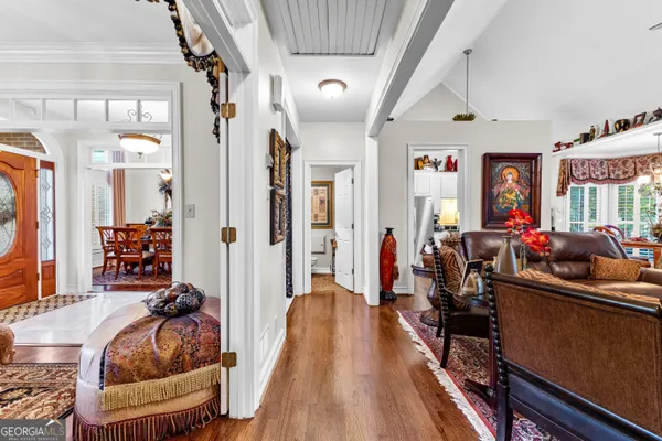 a bathroom with a double vanity sink a mirror and shower
