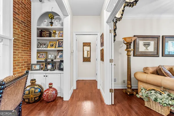 a kitchen with stainless steel appliances a stove a sink and a refrigerator