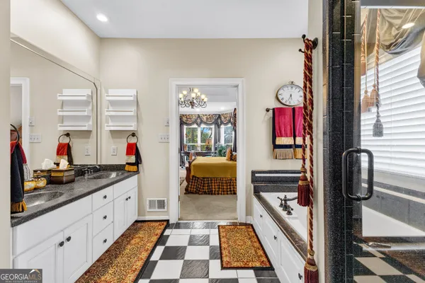 a kitchen with a sink and cabinets