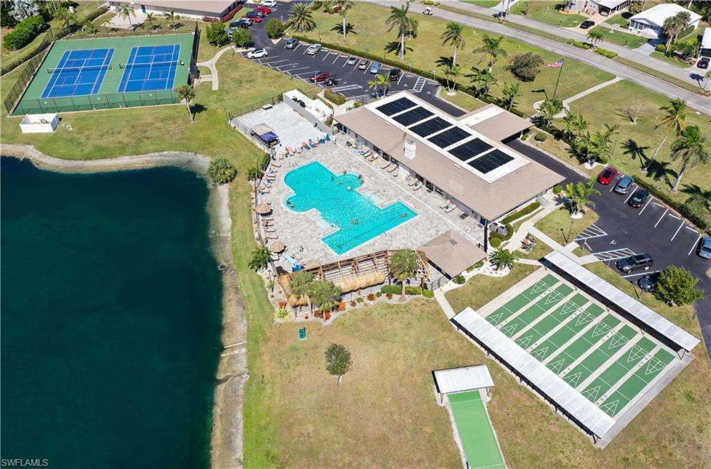 814 Charlemagne Boulevard Naples, FL 34112 - Photo 30 of 33 an aerial view of a house with a yard