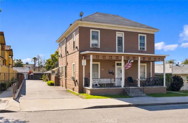 a front view of a house with swimming pool