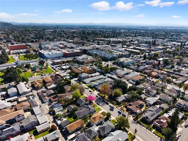 an aerial view of a city with lots of residential buildings