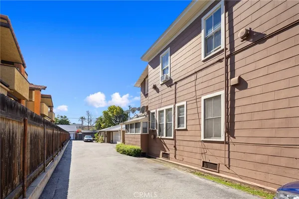 a view of a house with a street