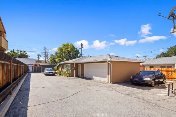 a view of a car parked in front of a building