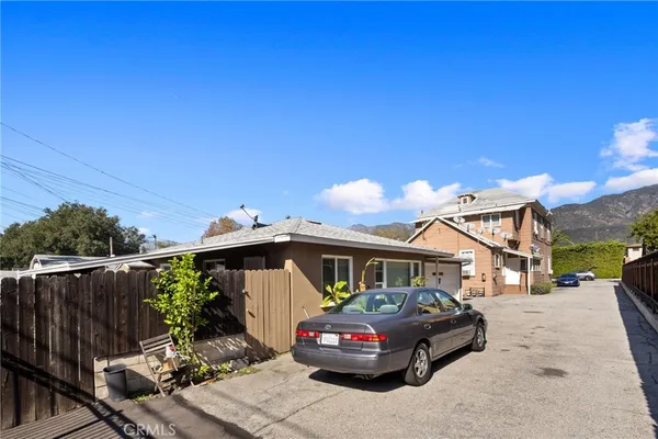 a car parked in front of a house