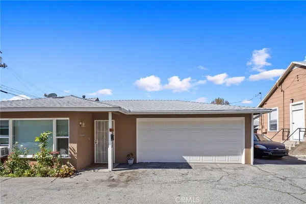 a view of a house with patio