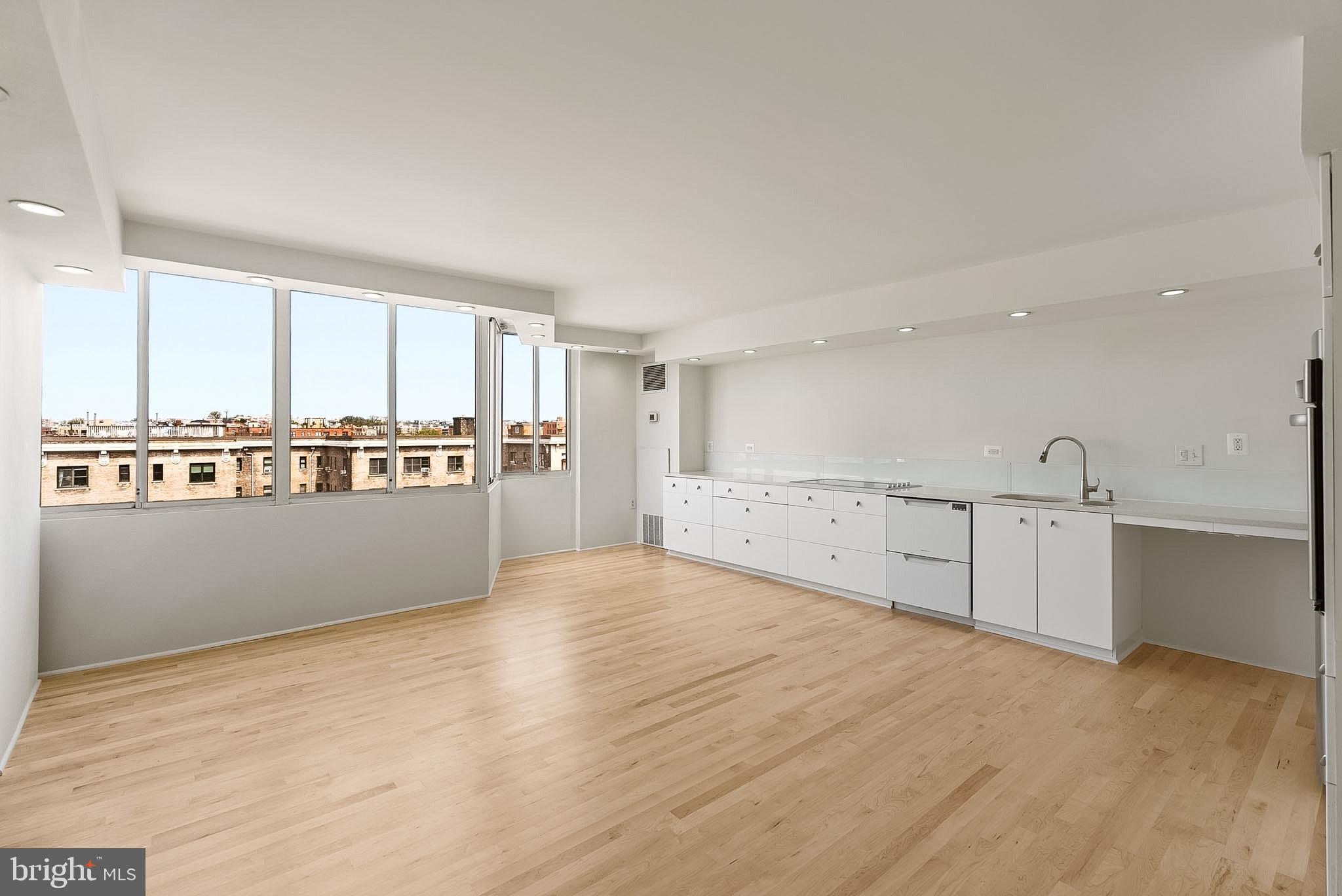 1718 P Street Northwest, Unit 902 Washington, DC 20036 - Photo 16 of 37 Bright, airy space with skyline views.