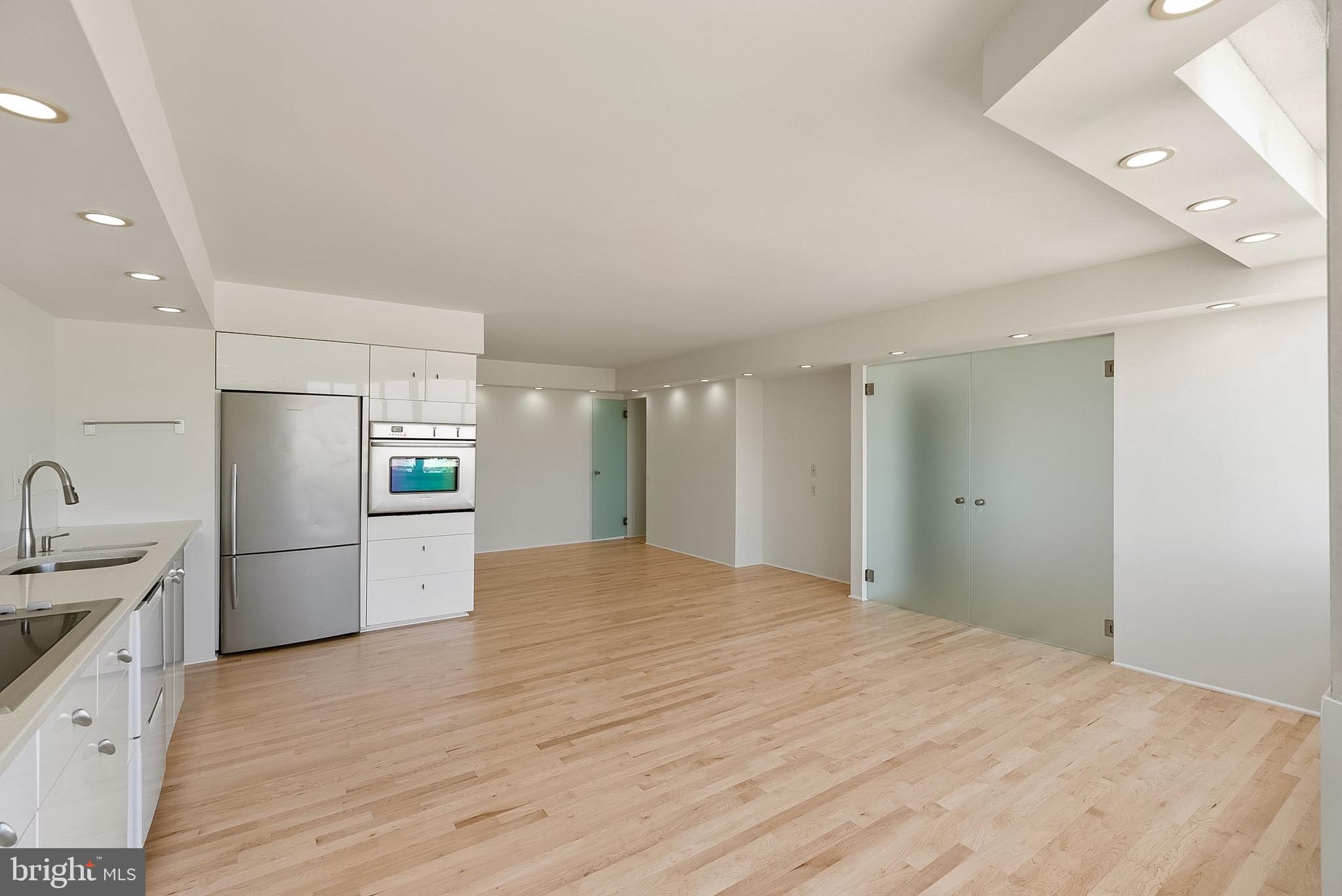 1718 P Street Northwest, Unit 902 Washington, DC 20036 - Photo 19 of 37 Spacious modern kitchen with elegance.