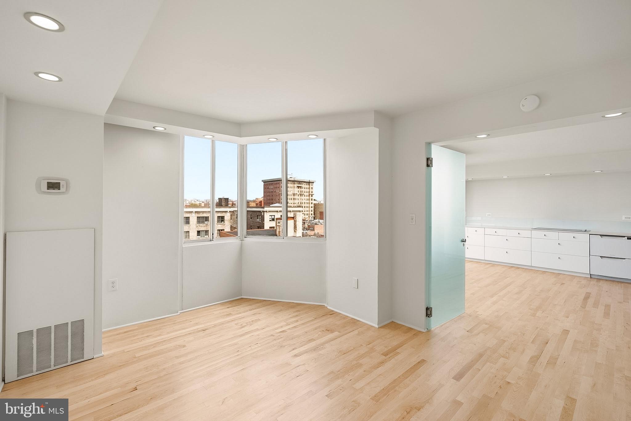 1718 P Street Northwest, Unit 902 Washington, DC 20036 - Photo 24 of 37 Bright, airy space with city views.