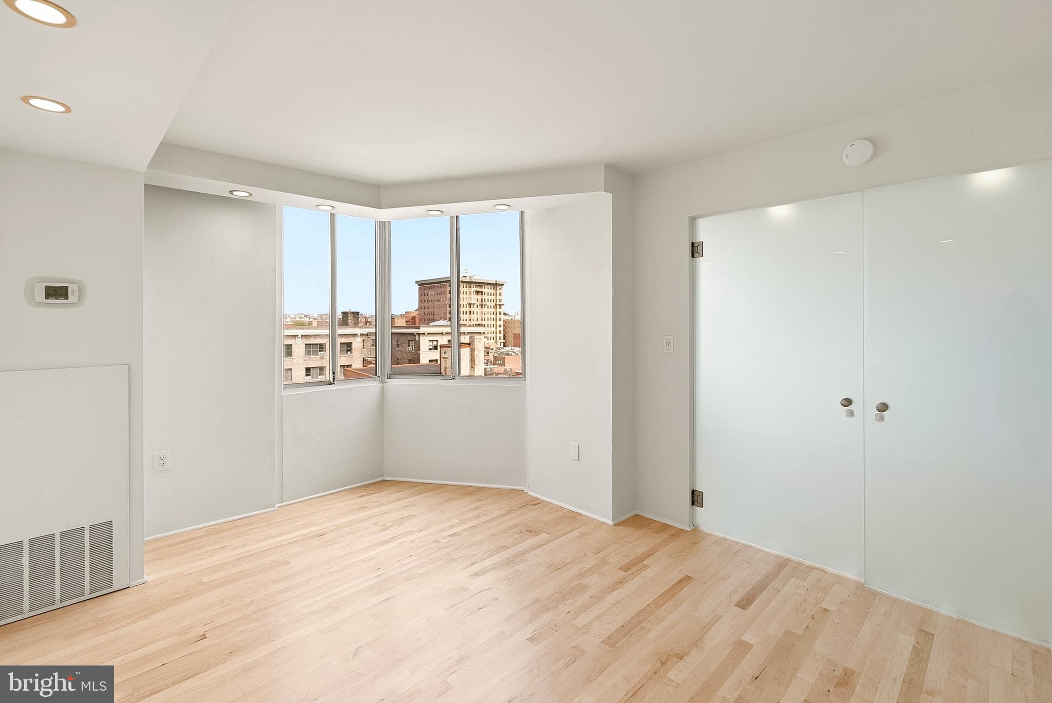 1718 P Street Northwest, Unit 902 Washington, DC 20036 - Photo 25 of 37 Bright, airy space with city views.