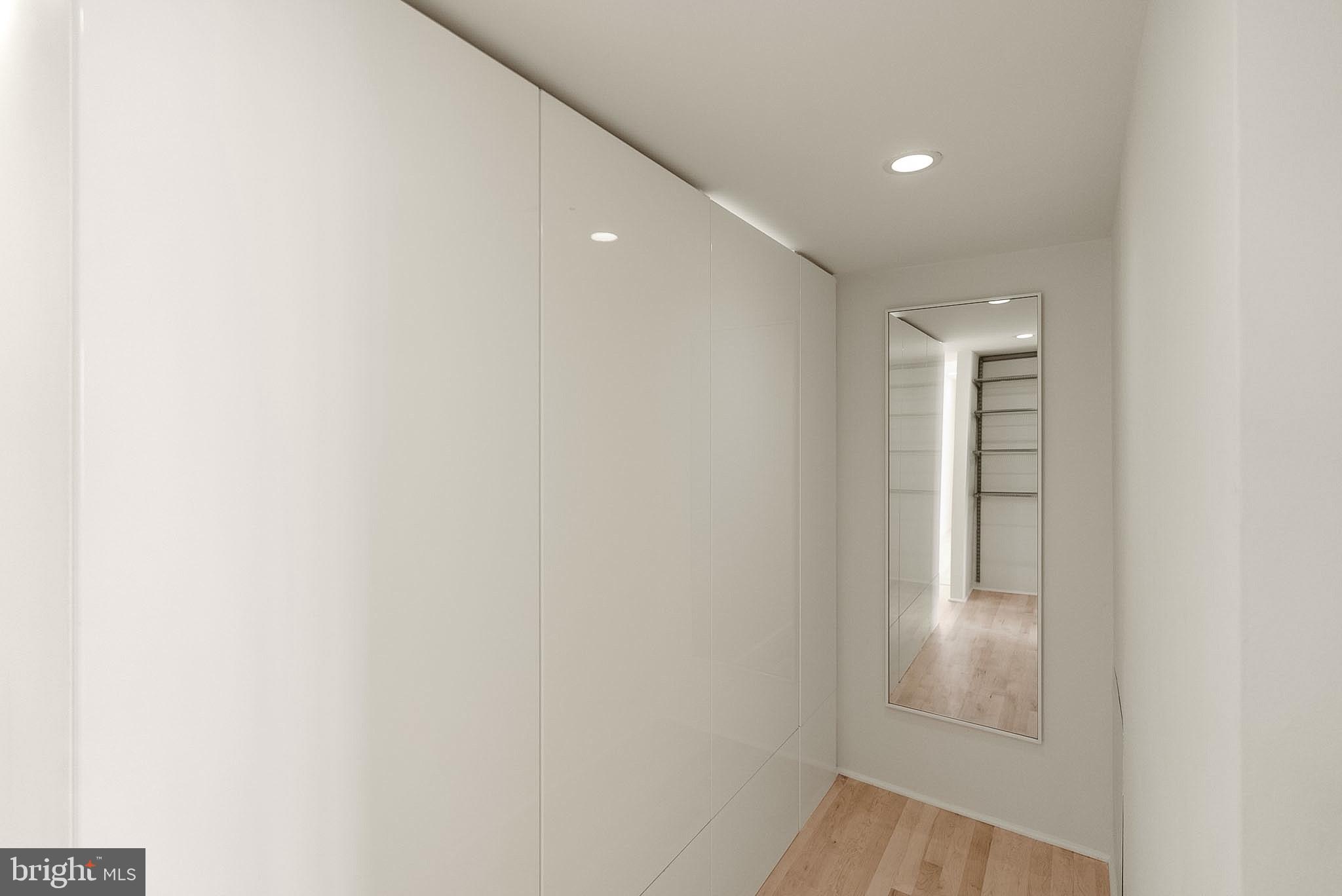 1718 P Street Northwest, Unit 902 Washington, DC 20036 - Photo 31 of 37 Sleek hallway with modern elegance.