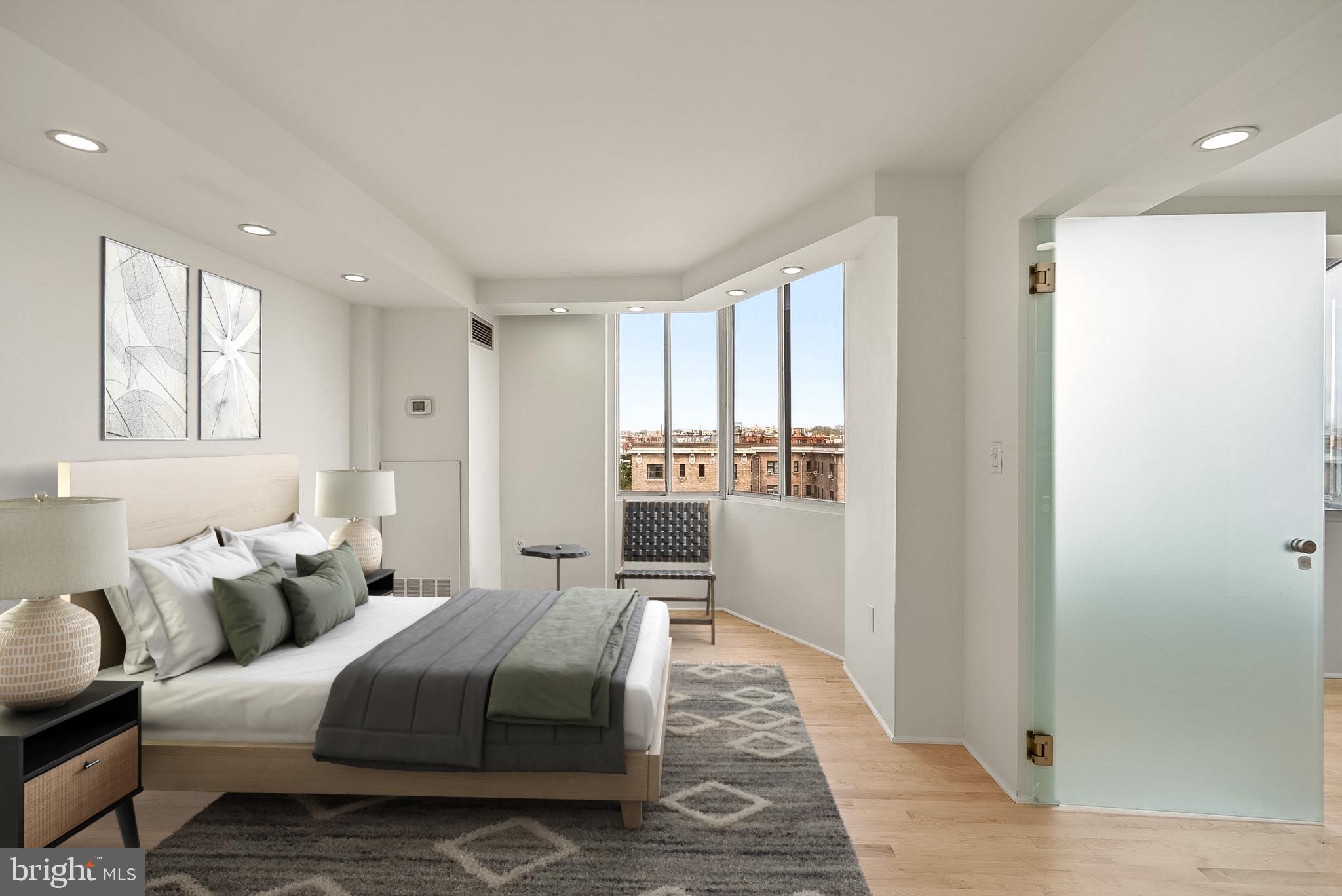 1718 P Street Northwest, Unit 902 Washington, DC 20036 - Photo 7 of 37 Bright, modern bedroom with city views.