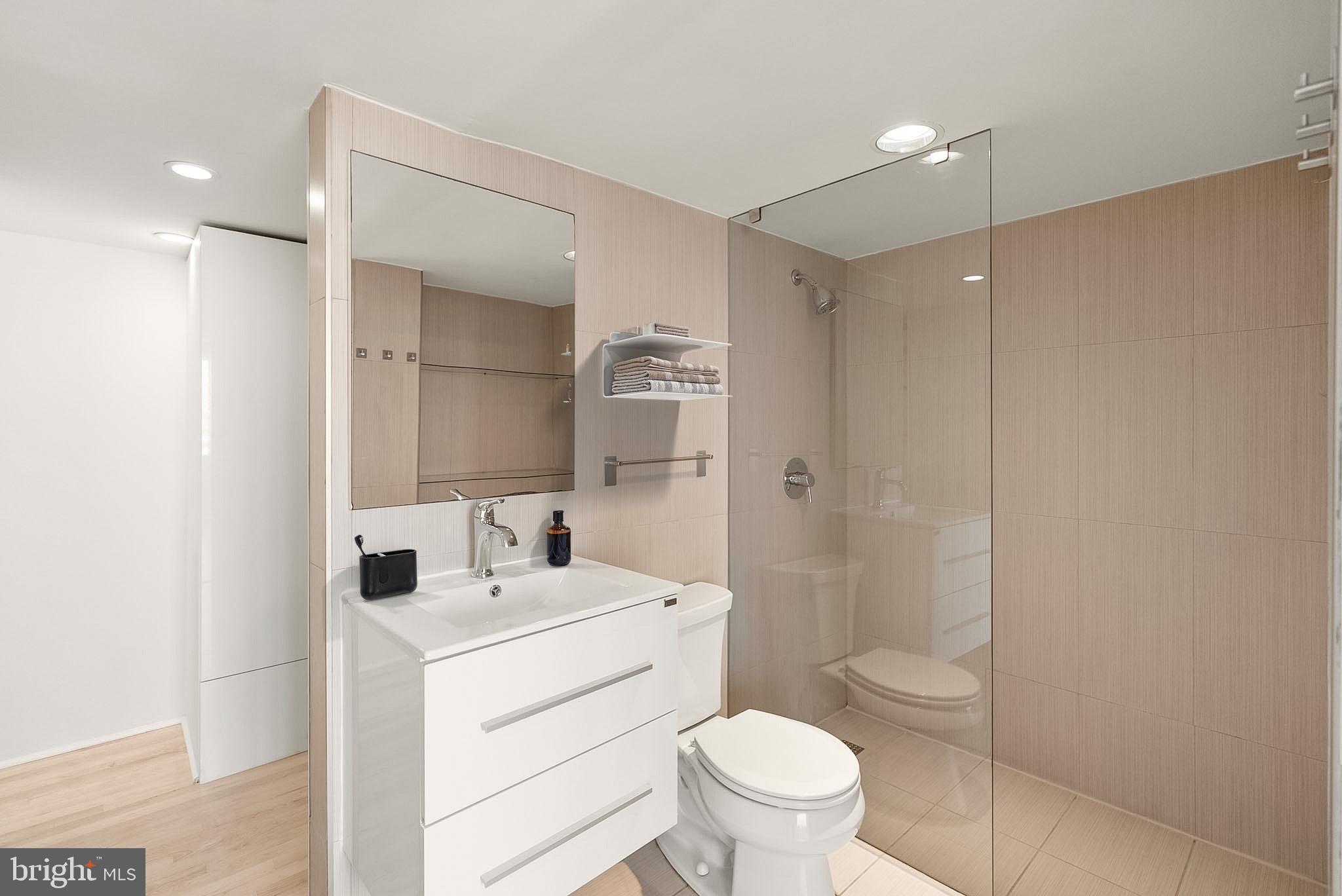 1718 P Street Northwest, Unit 902 Washington, DC 20036 - Photo 10 of 37 Sleek modern bathroom oasis.