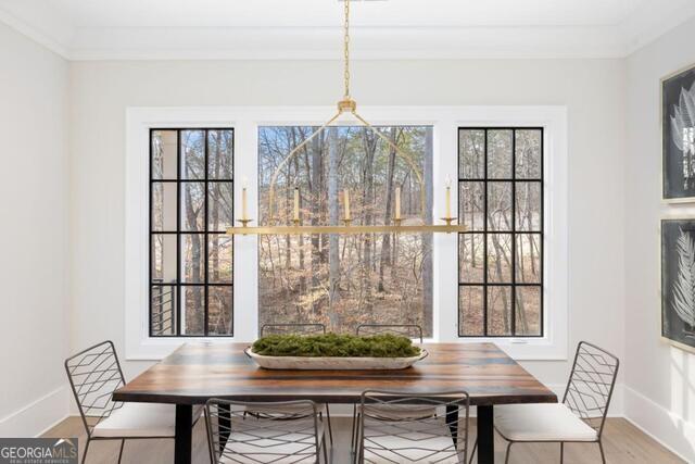 2701 Conns Creek Road, Unit 40 Ball Ground, GA 30107 - Photo 11 of 16 a dining room with furniture and window