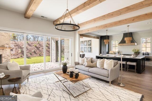 2701 Conns Creek Road, Unit 40 Ball Ground, GA 30107 - Photo 15 of 16 a living room with furniture and a large window