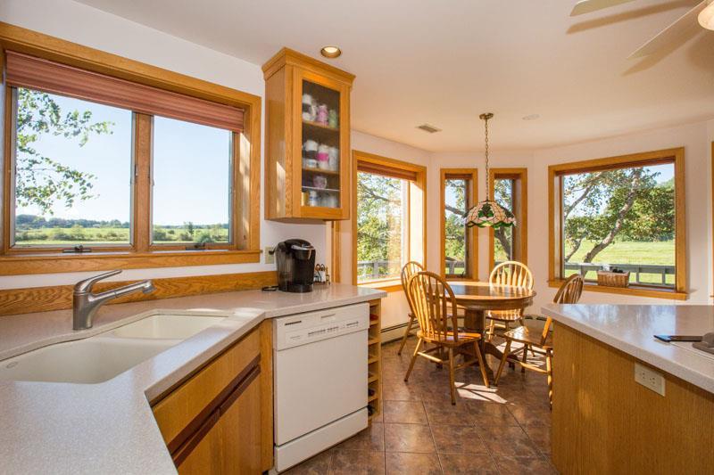 128 Longwoods Road Cumberland Center, ME 04021 - Photo 10 of 35 Its a delight to sit at the kitchen...