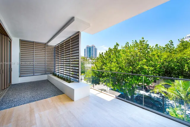 a view of a terrace with a garden