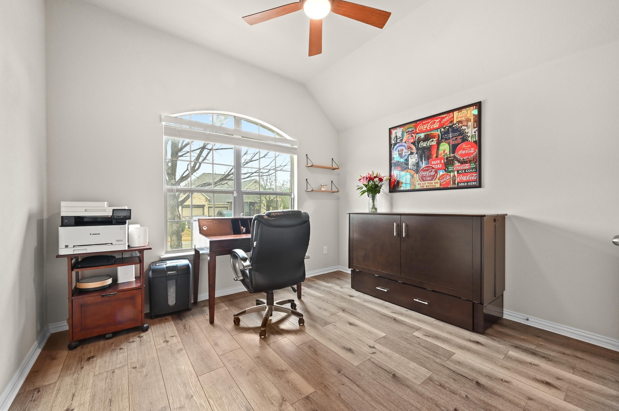 546 Hot Spring Valley Buda, TX 78610 - Photo 20 of 27 Home office with a ceiling fan, lofted ceiling, and light wood finished floors