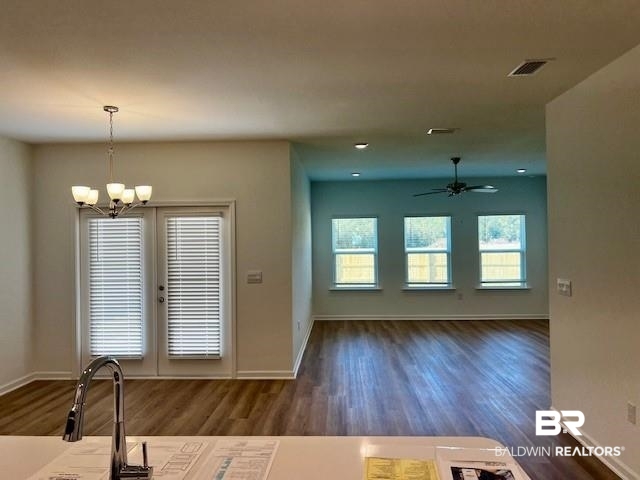 13822 Antler Hl Road Daphne, AL 36527 - Photo 2 of 39 Kitchen featuring sink, dark hardwood / wood-style flooring, decorative light fixtures, and ceiling fan with notable chandelier