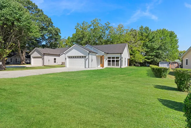 a house view with a garden space