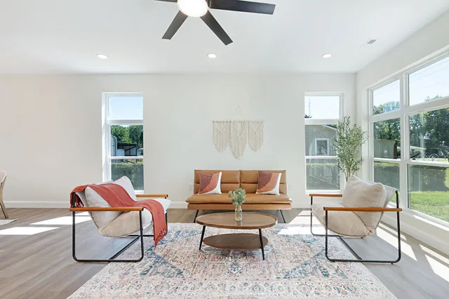 a living room with furniture and a window