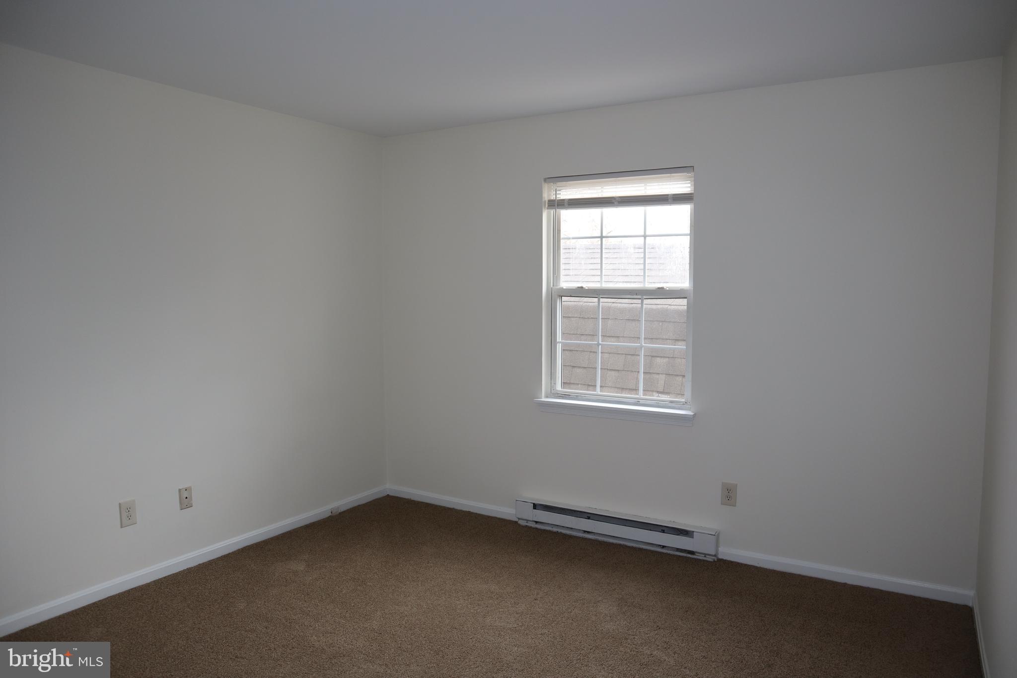 2 West Pine Street Delmar, MD 21875 - Photo 11 of 23 an empty room with a window