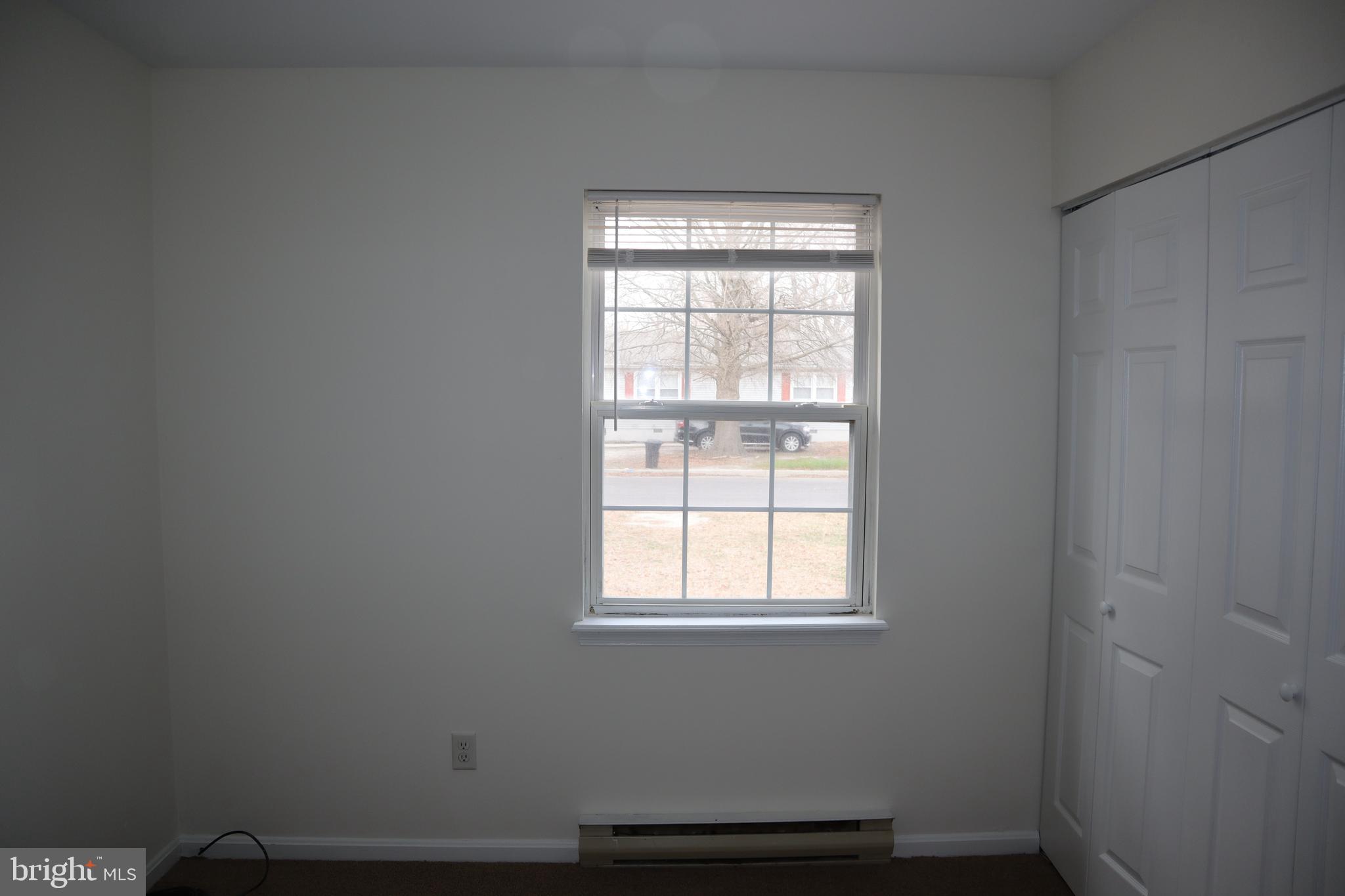 2 West Pine Street Delmar, MD 21875 - Photo 18 of 23 a room that has a window in it
