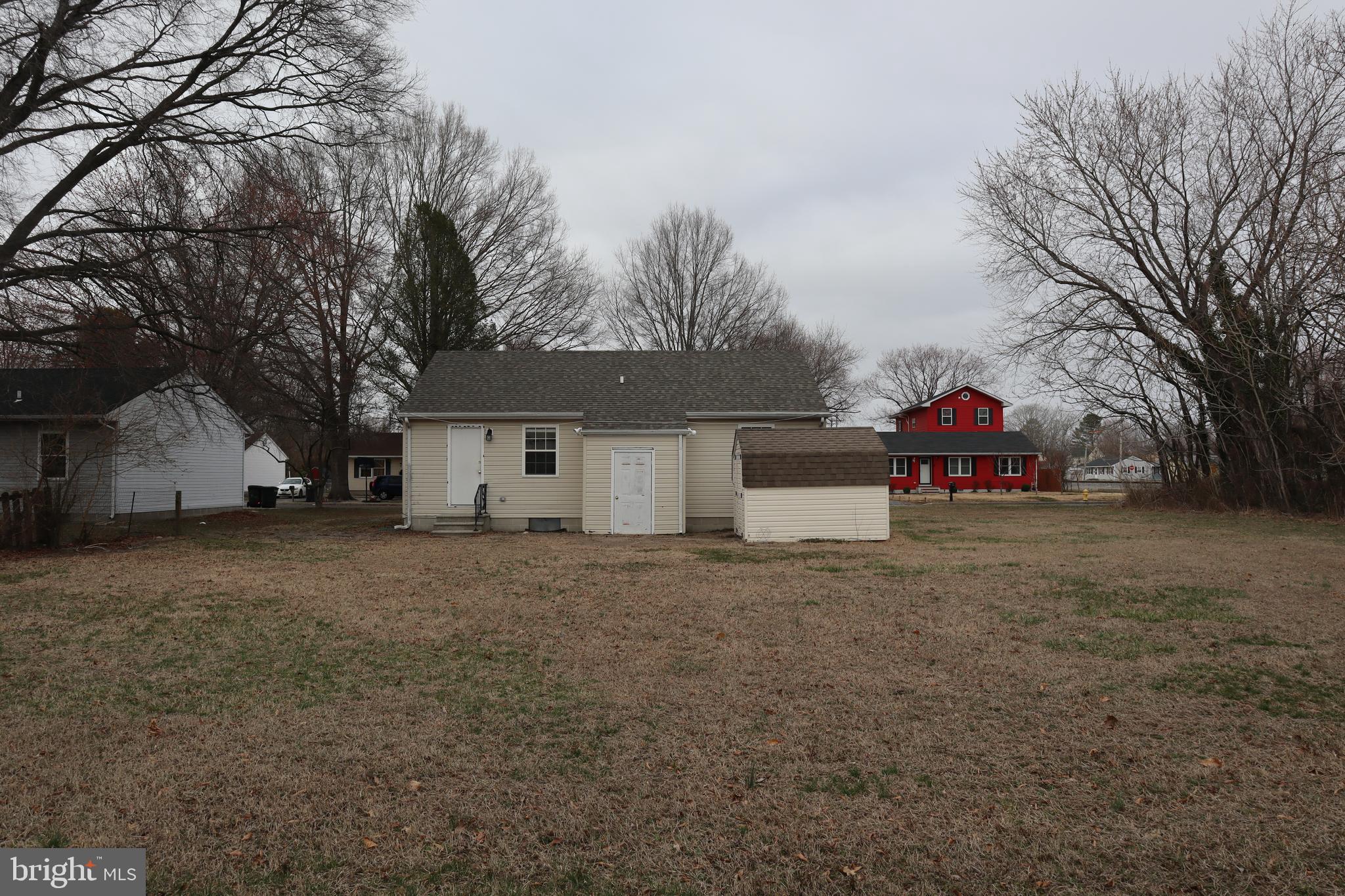 2 West Pine Street Delmar, MD 21875 - Photo 22 of 23 a view of a house with a yard and garage