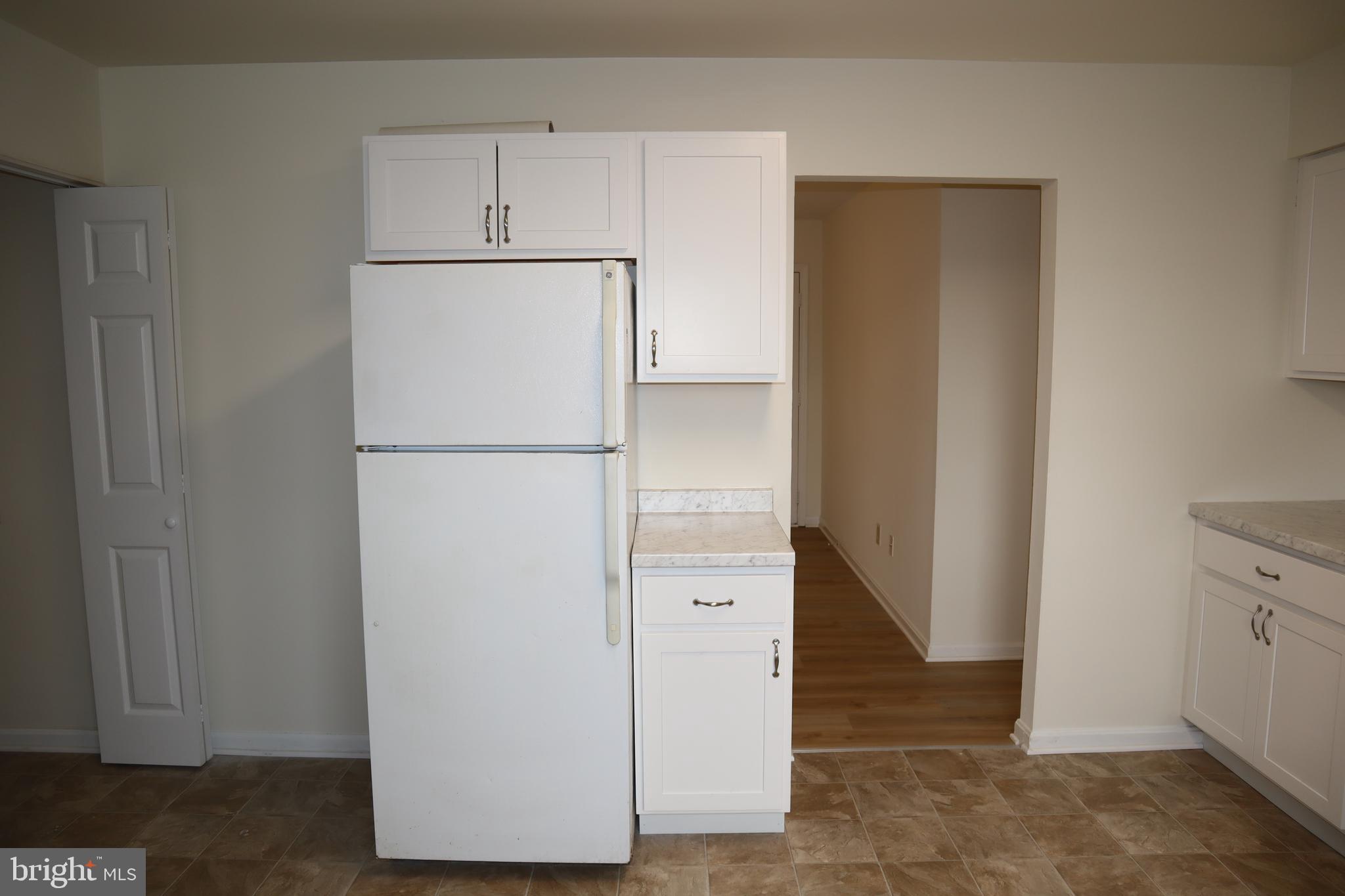 2 West Pine Street Delmar, MD 21875 - Photo 8 of 23 a view of walk in closet with empty racks